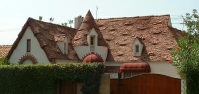 Classic storybook home with exceptionally crafted seawave roof.