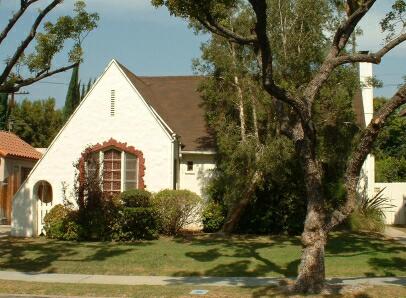 Asymmetrical storybook home.