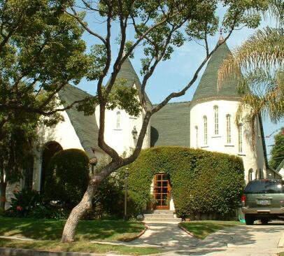 A rare double-tower storybook home.