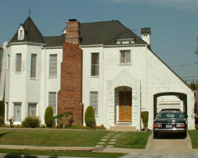 Storybook home with carport.