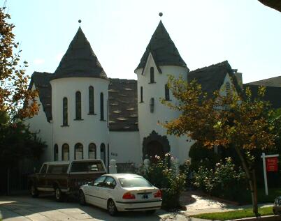 Two-tower storybook with seawave roof.